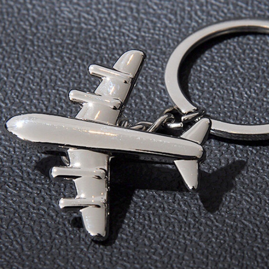 ODETOJOY Argenté Porte-clés avion à réaction en métal Avion avec Ligne en  Acier Inoxydable Porte-clés Avion : : Mode